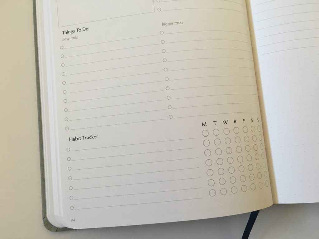unbound weekly planner overview checklist habit tracker pros and cons video review hardbound gender neutral goal setting blogger