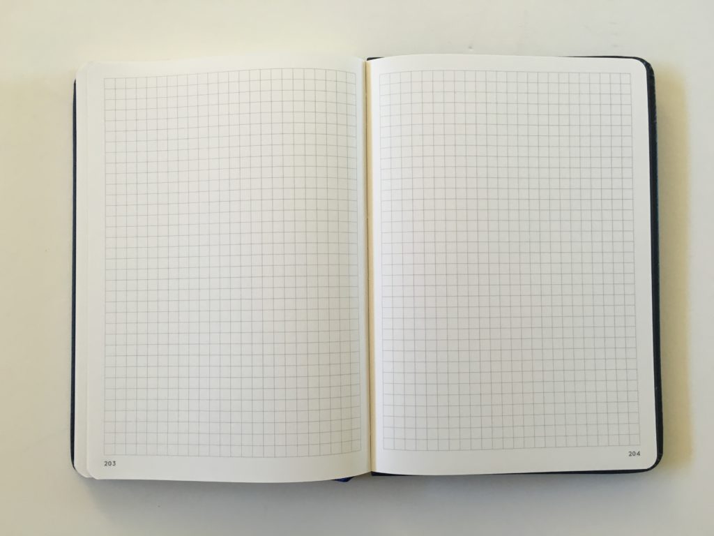 a5 bullet journal notebook otto officeworks dot grid bright white paper hardbound numbered dot grid pages grid lined ribbon boomark