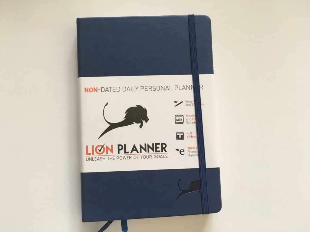 lion planner review weekly minimalist pros and cons undated goals monthly bright white paper gender neutral