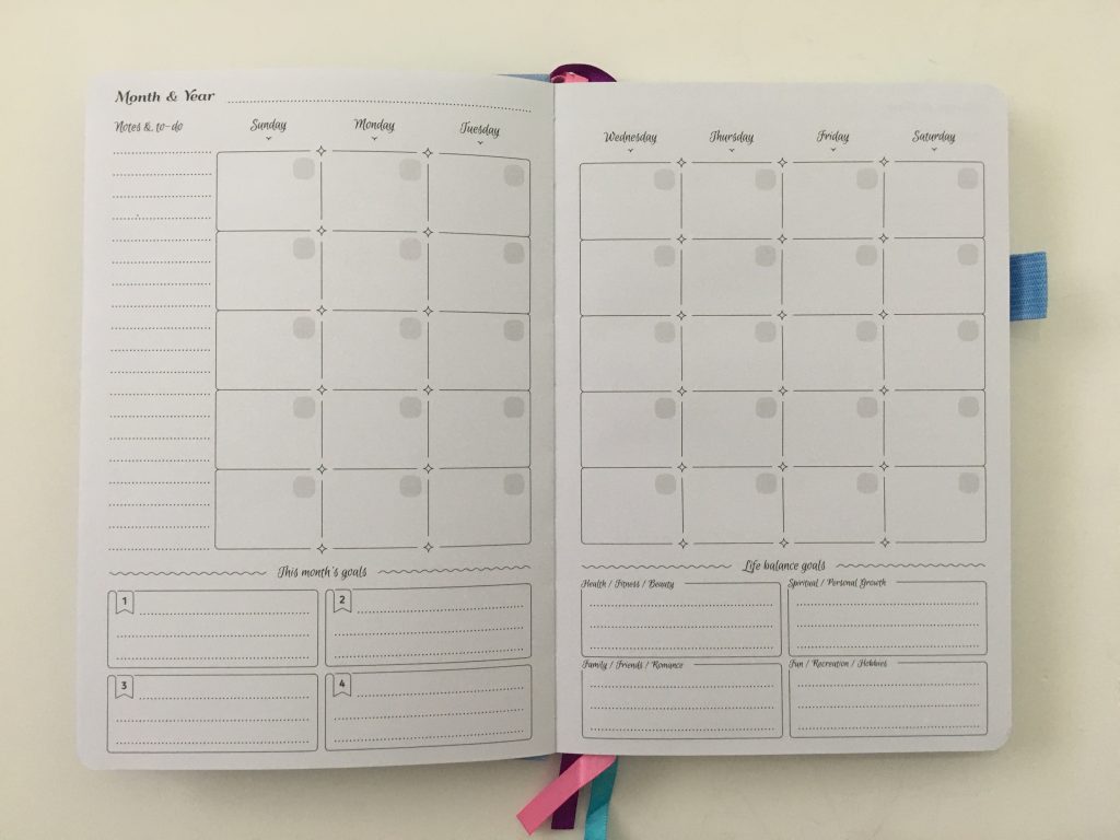 go girl planner review undated weekly monthly sewn bound horizontal lined goals habit tracker checklist bright white paper rainbow stickers pocket folder minimalist_09