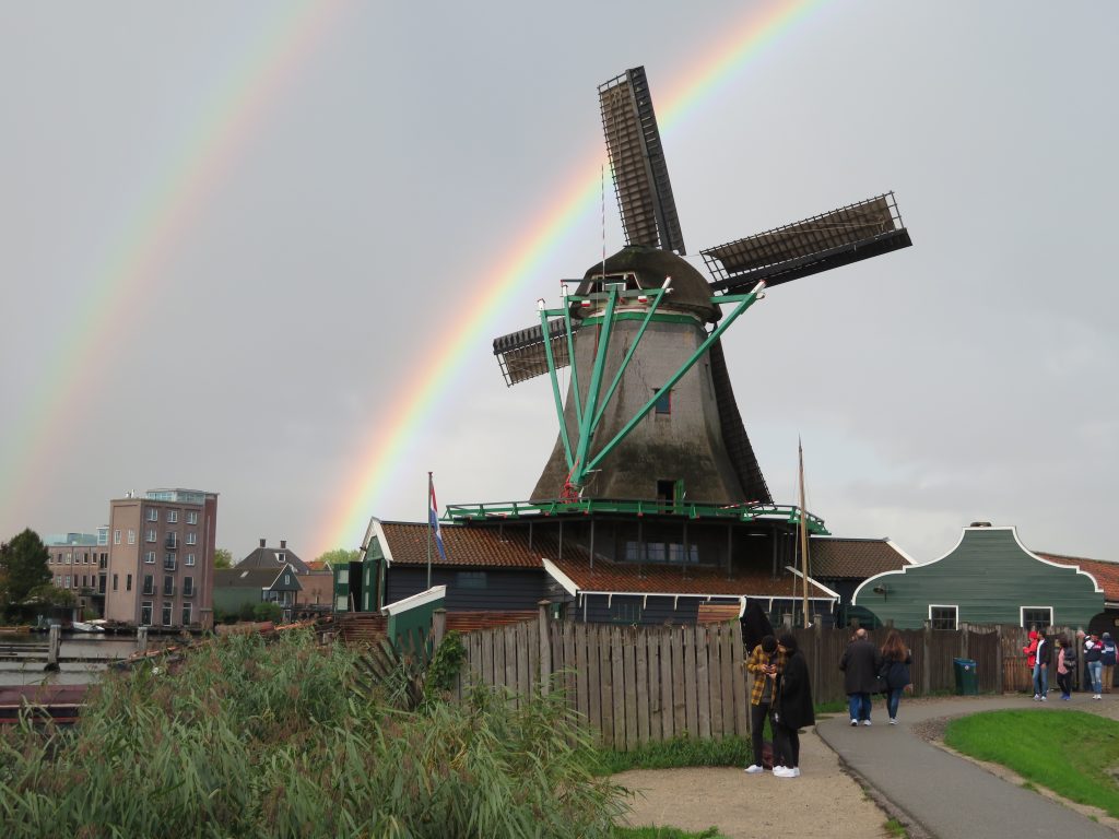 Zaanse Schans diy day trip from amsterdam on the train windmills photo spots october eat clog workshop cheese factory chocolate october weather rainbow