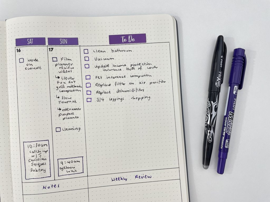 roterunner inspired weekly spread bullet journal paperchase agenzio dot grid notebook frixion erasable twin tone marker purple and black theme-min
