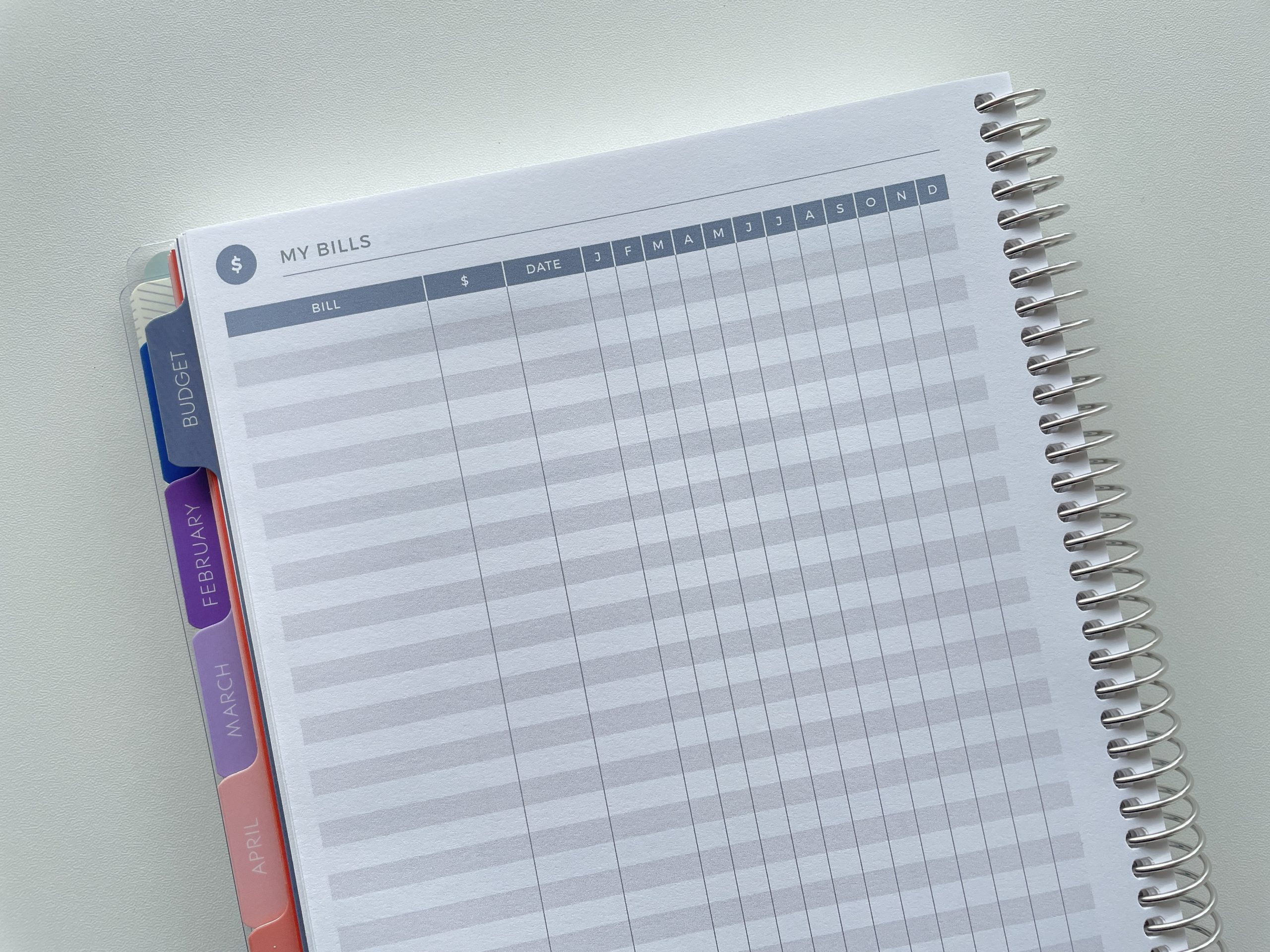 plum paper budget planner bills track spending income expenses savings goals monthly yearly weekly