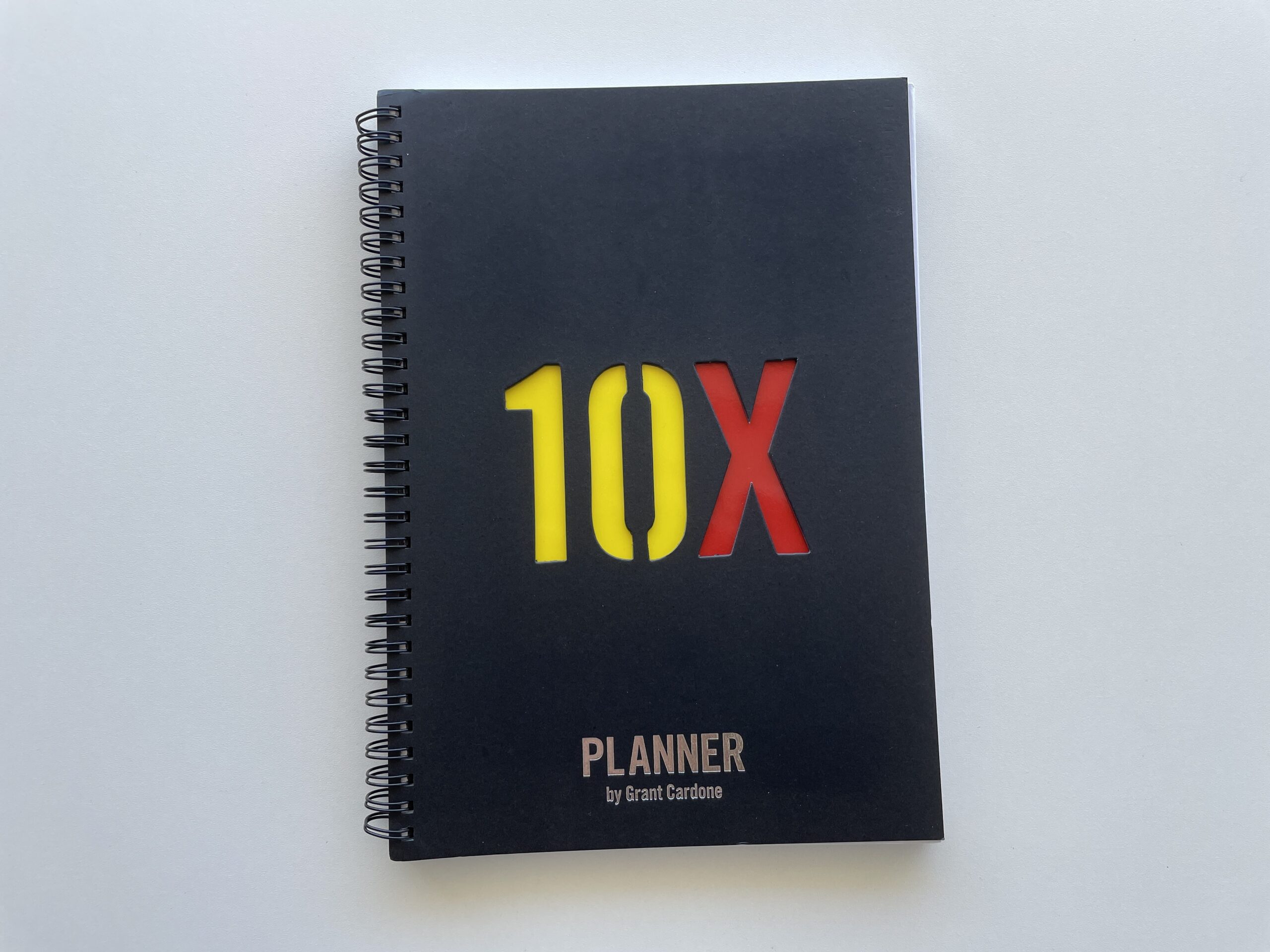 10x planner review grant cardone daily planner day to a page layout timed schedule minimalist business self employed student goals