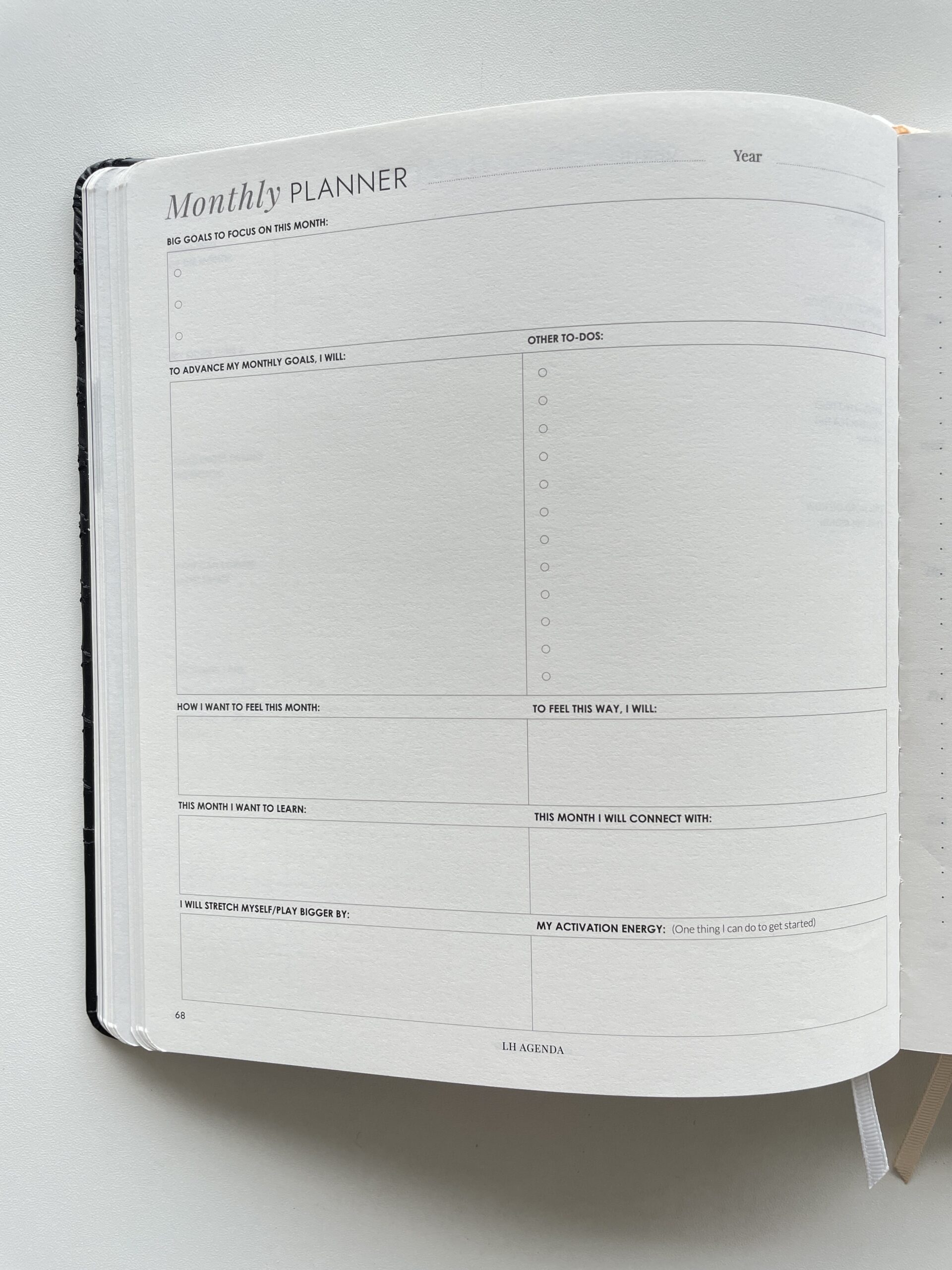 LH Agenda monthly planner personal work goals checklists simple minimalist layout large sewn bound planner