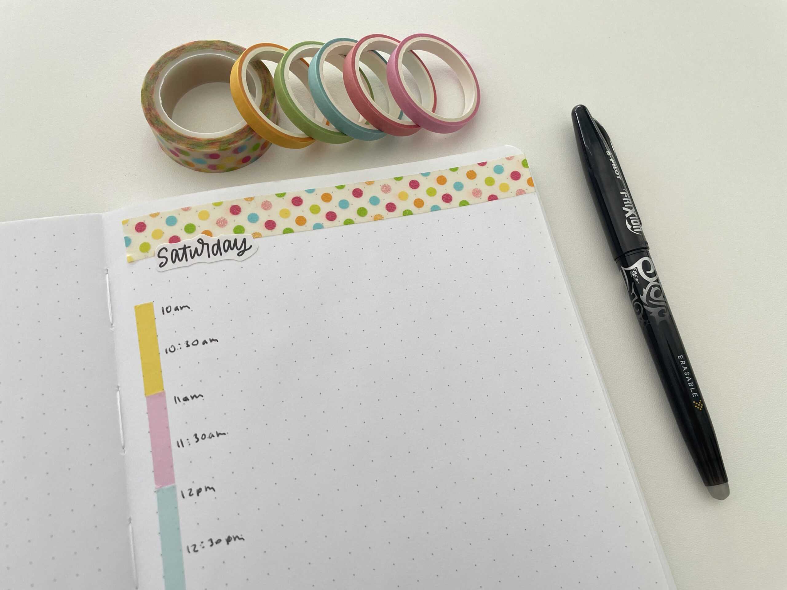 bullet journal simply daily planner spread day to a page using washi tape color coded hourly timeslots polka dot